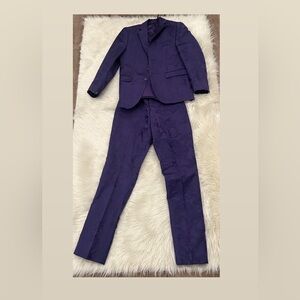 Rock this purple suit on the dance floor owning every move with style.